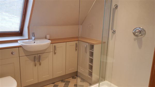 Shower room with sink, toilet and walk-in shower